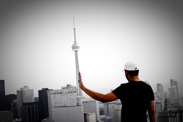 a view of the Toronto skyline from a roof top